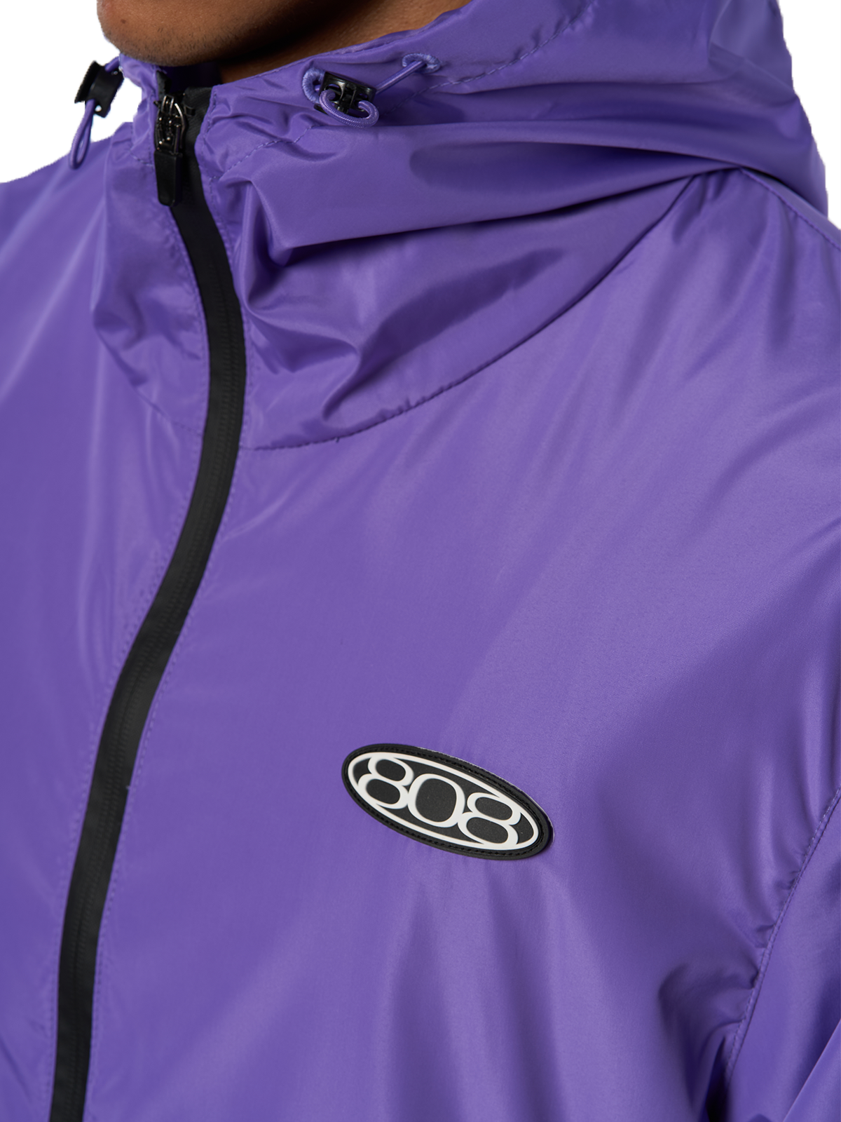Lila Windbreaker Regenjacke Wasserfest Weißes Logo