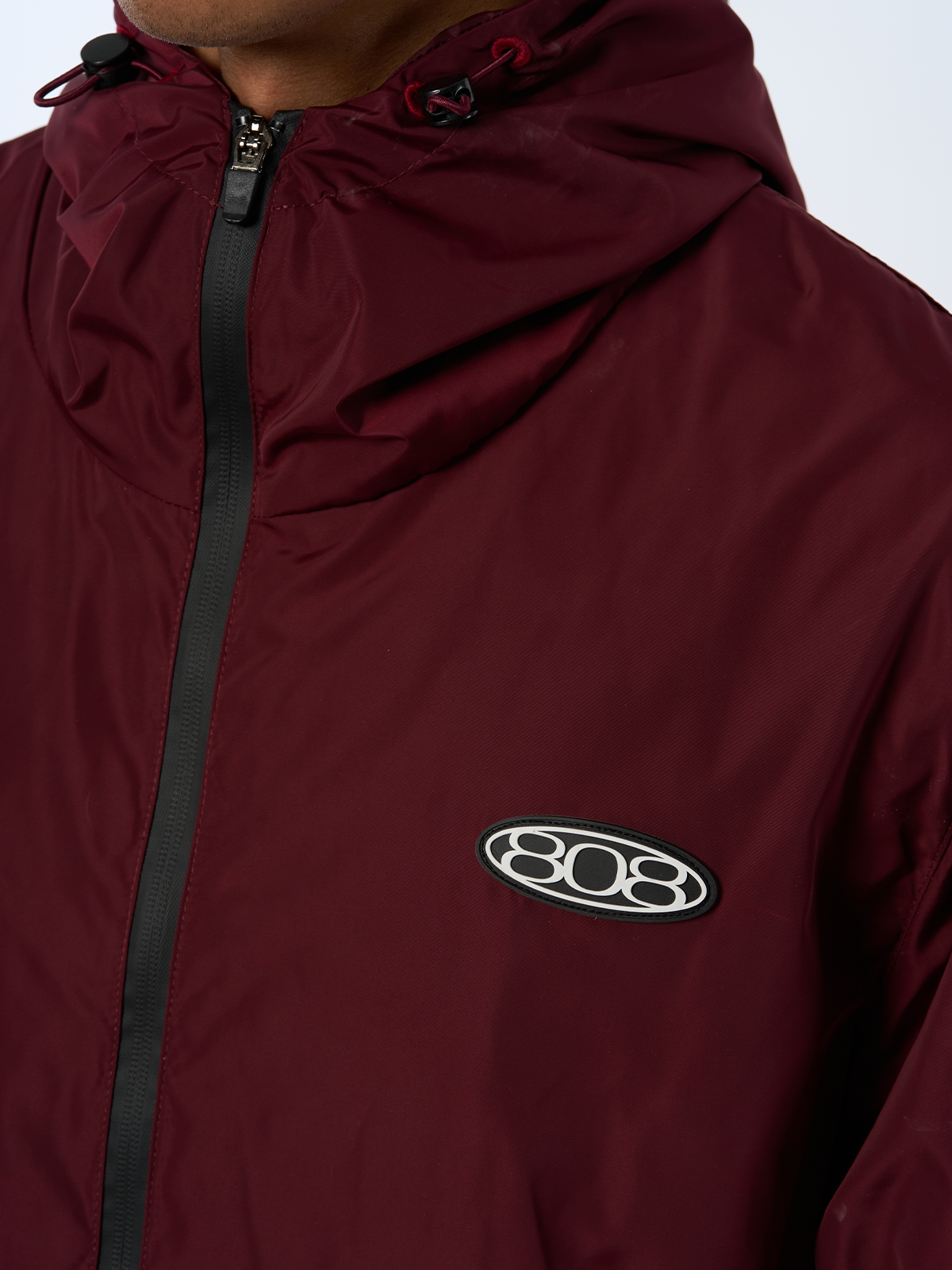 Roter Windbreaker Regenjacke Wasserfest Weißes Logo